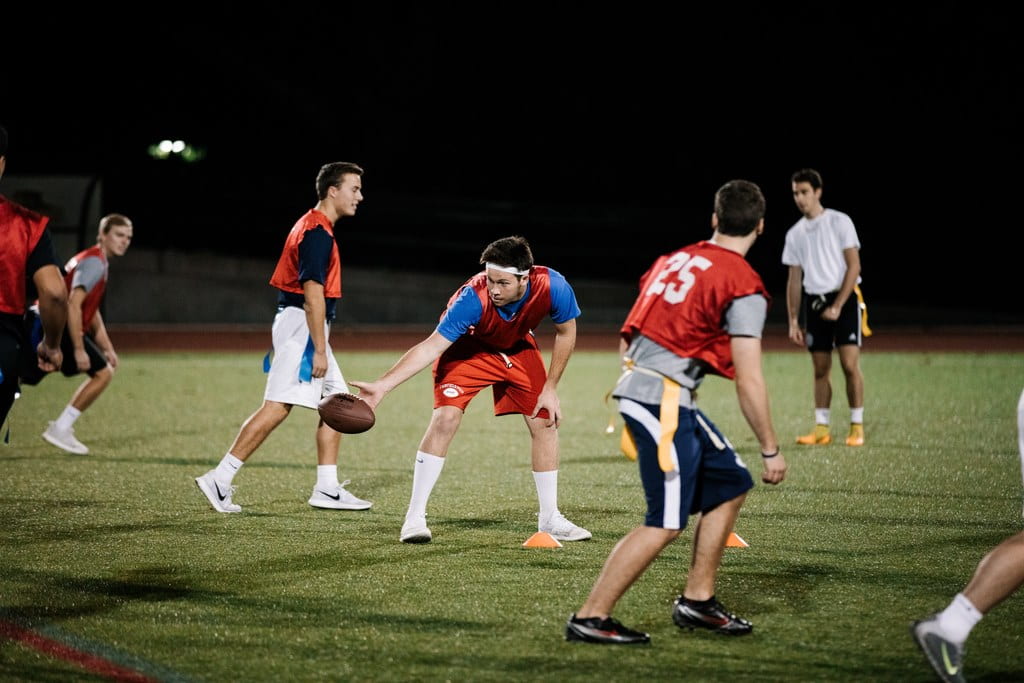Students play flag football