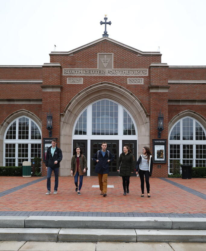 Students walk outside the Smith Center for the Arts