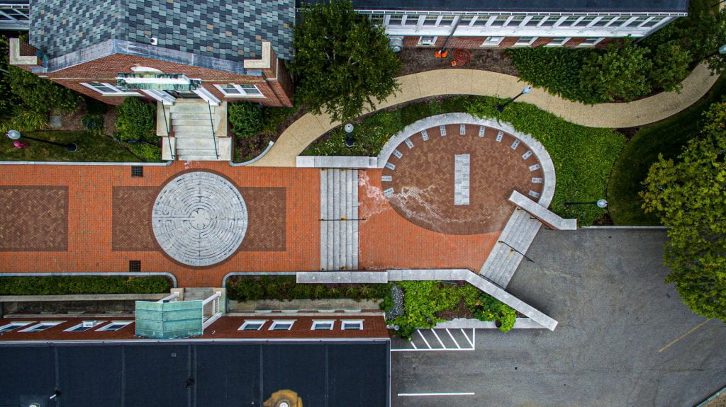 Aerial shot of the PC Art Walk, featuring a labyrinth as well as a sundial
